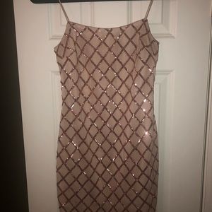 rhythm of love dress in rose gold